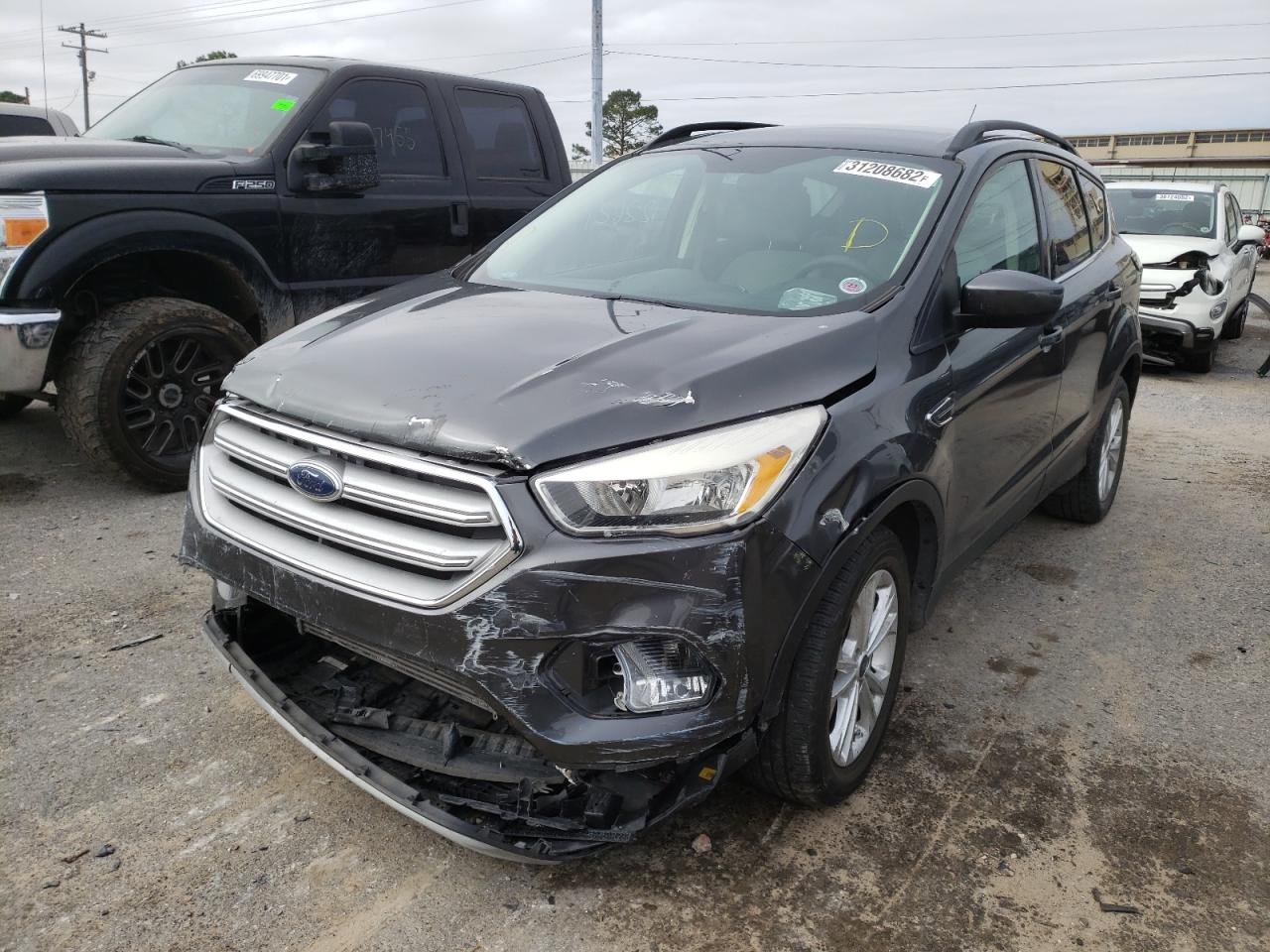 Photo 2 from auction – 2018 FORD ESCAPE SE with VIN 1FMCU0G99JUB48952