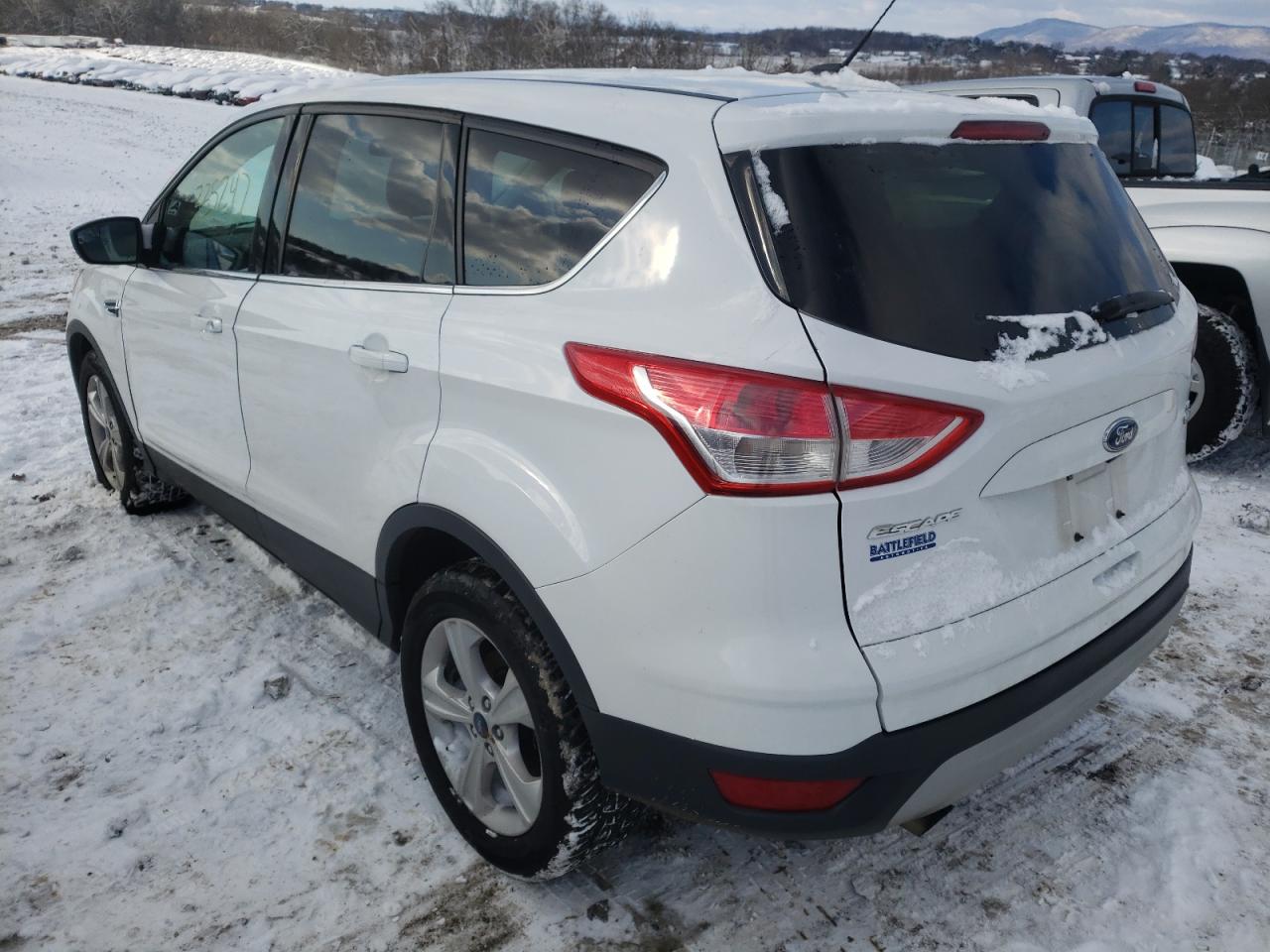 Photo 3 from auction – 2016 FORD ESCAPE SE with VIN 1FMCU9GX8GUB25819