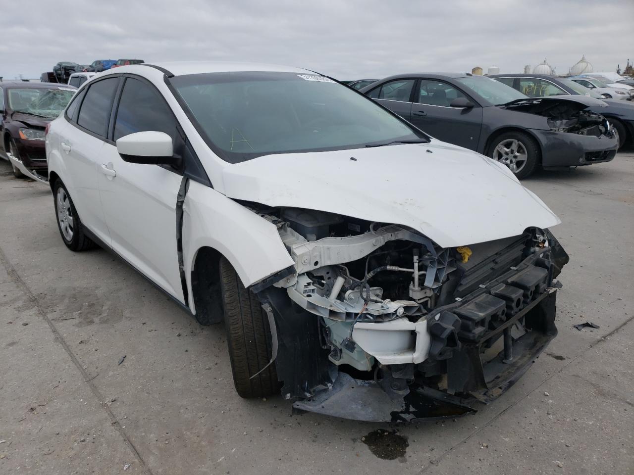FORD FOCUS SE 2014 with VIN 1FADP3F22EL222025 - Photo from auction