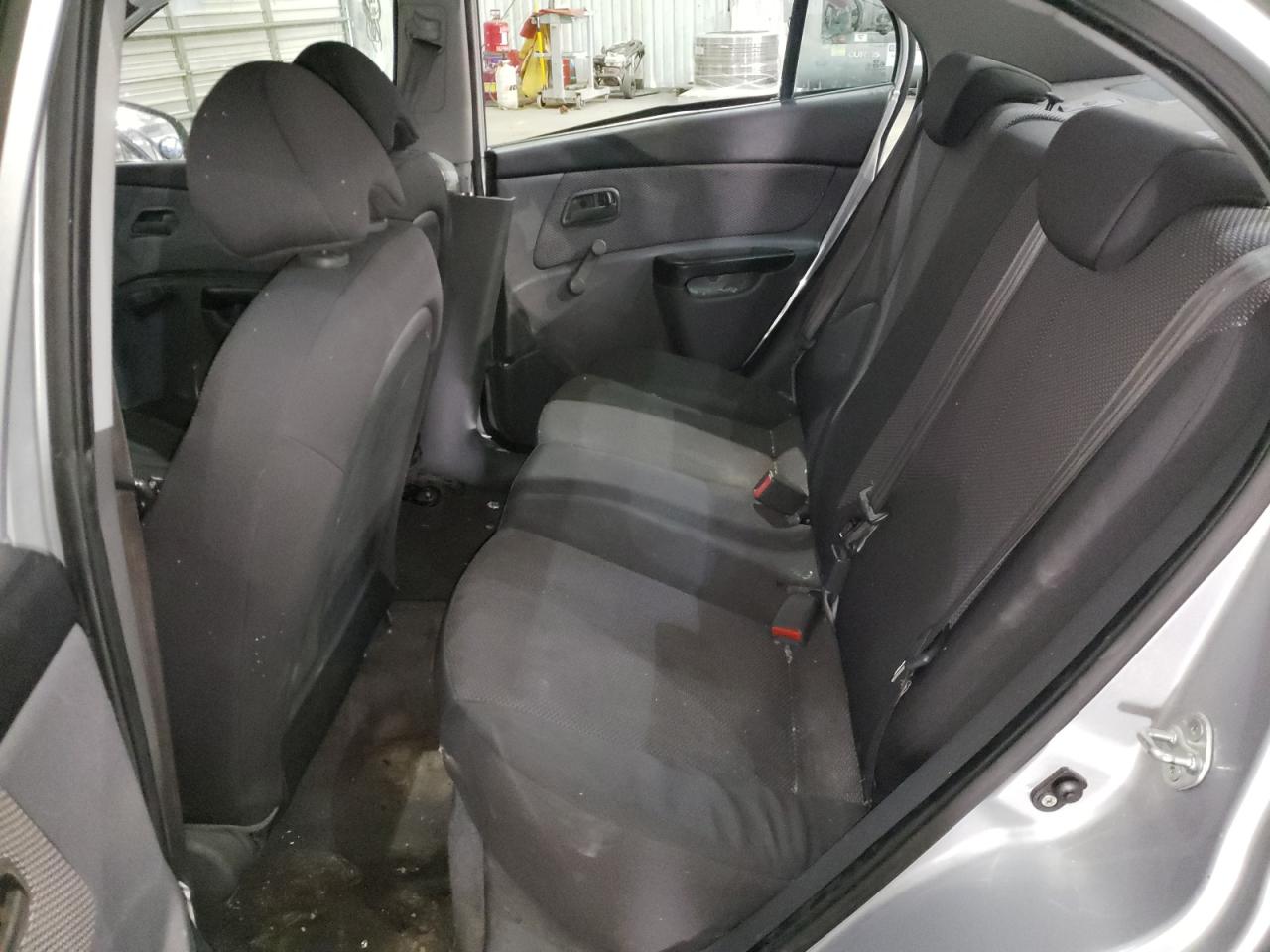 Photo 6 from auction – 2011 KIA RIO BASE with VIN KNADH4A39B6734398