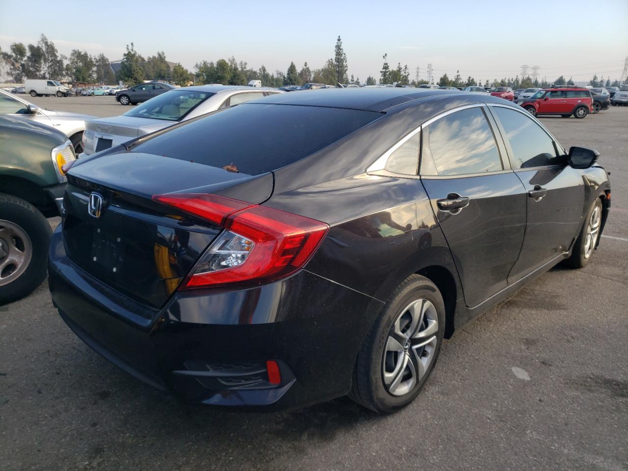 Photo 4 from auction – 2018 HONDA CIVIC LX with VIN 2HGFC2F54JH552941