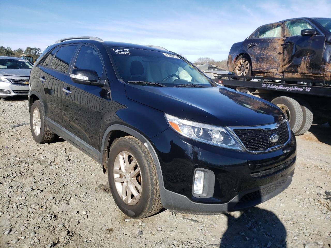 KIA SORENTO LX 2014 with VIN 5XYKT3A65EG520409 - Photo from auction