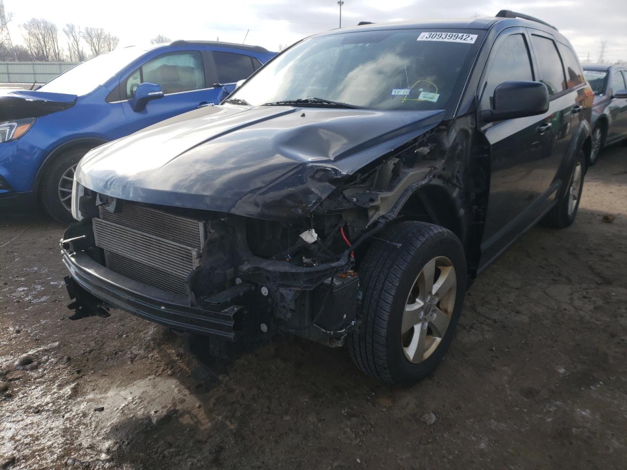 Photo 2 from auction – 2013 DODGE JOURNEY SE with VIN 3C4PDCABXDT556863