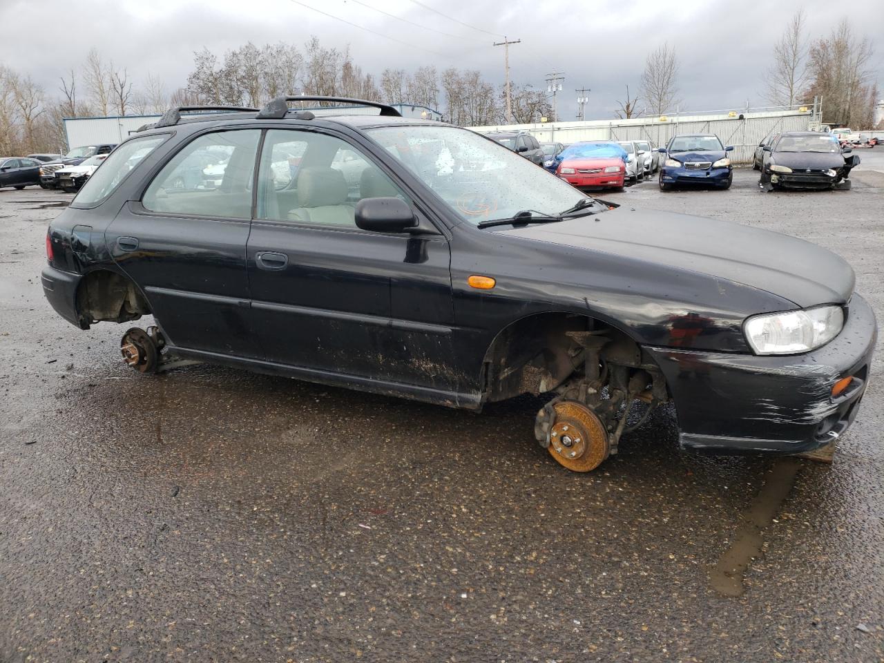 Photo 9 from auction – 1999 SUBARU IMPREZA L with VIN JF1GF4355XG814969