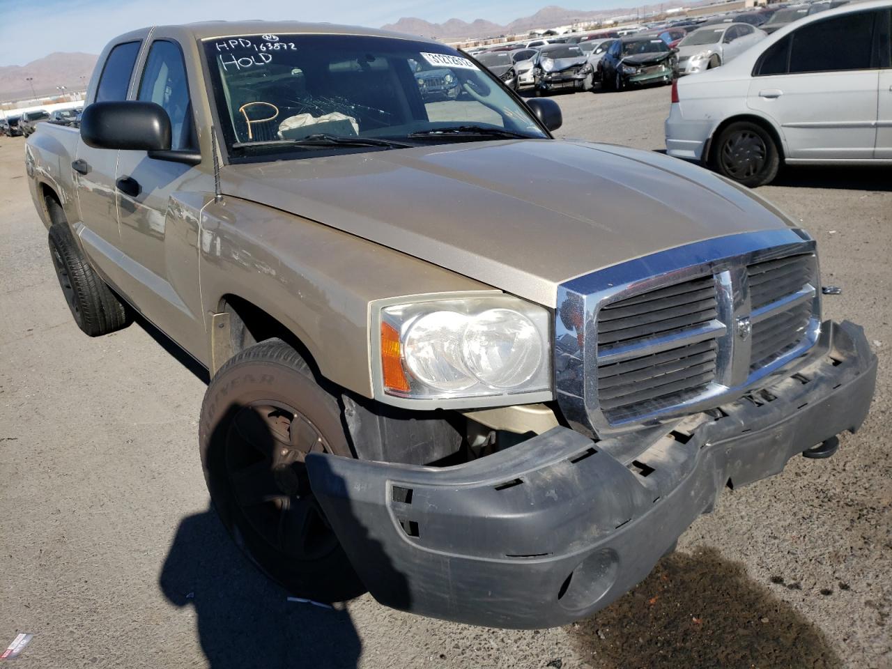 DODGE DAKOTA SLT 2011 with VIN 1D7RW3GK2BS564325 - Photo from auction