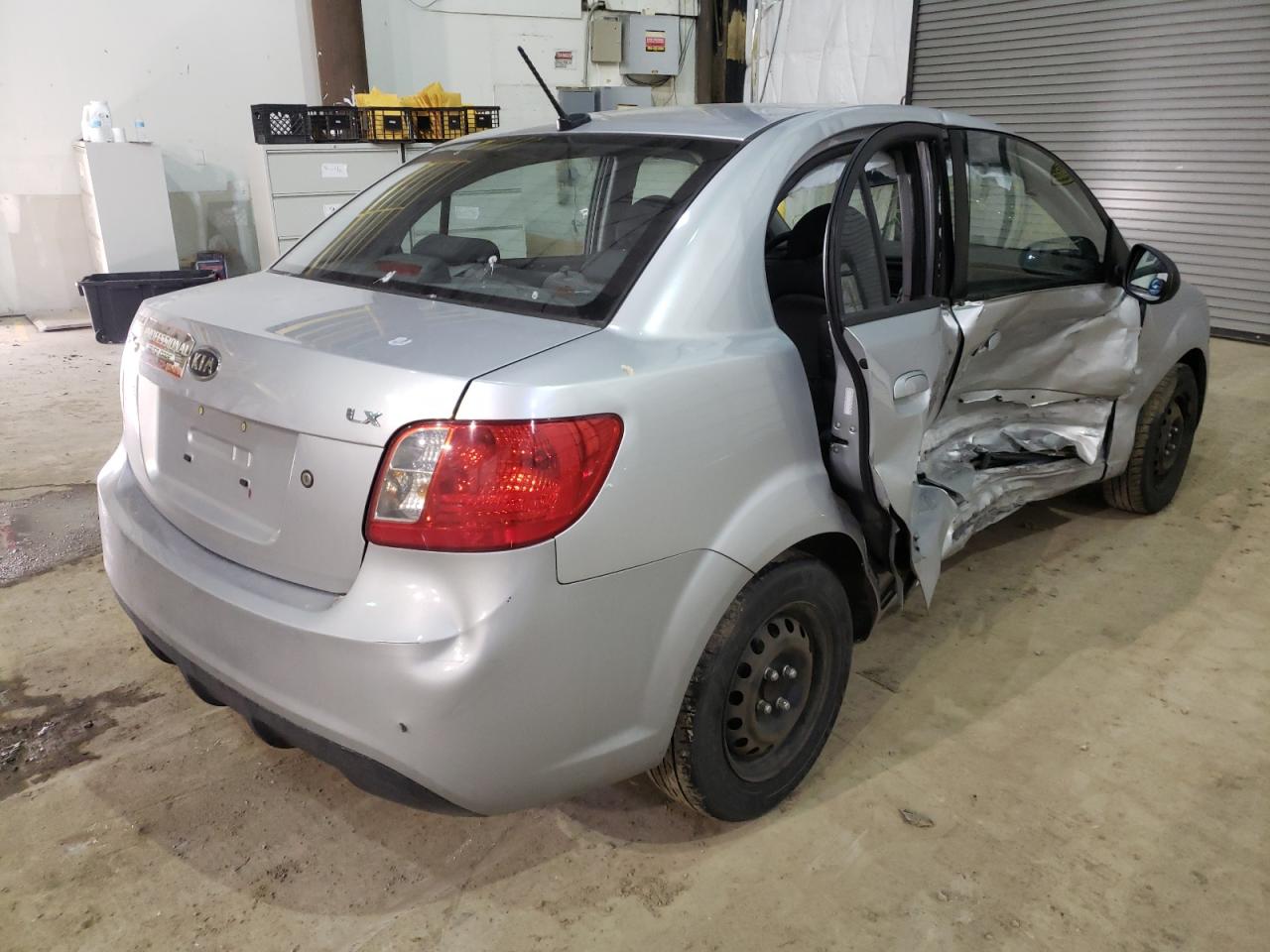 Photo 4 from auction – 2011 KIA RIO BASE with VIN KNADH4A39B6734398