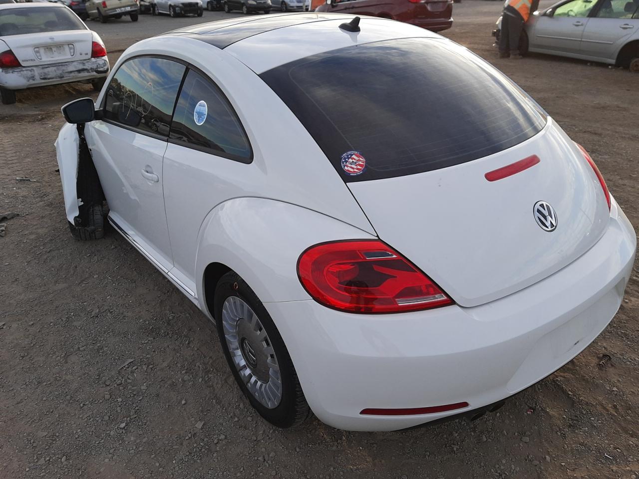 Photo 3 from auction – 2013 VOLKSWAGEN BEETLE with VIN 3VWJP7AT0DM672268