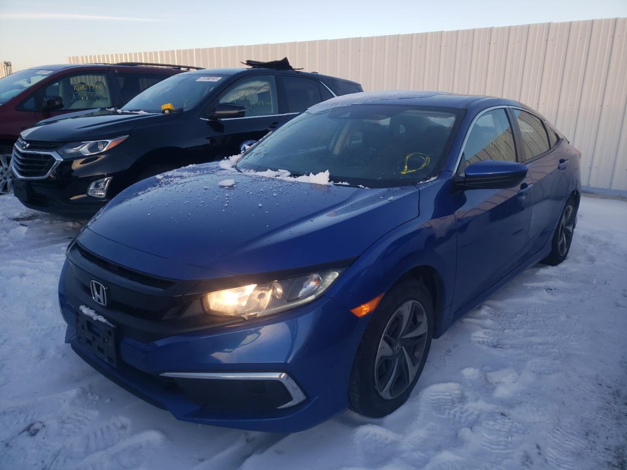 Photo 2 from auction – 2020 HONDA CIVIC LX with VIN 19XFC2F69LE031073
