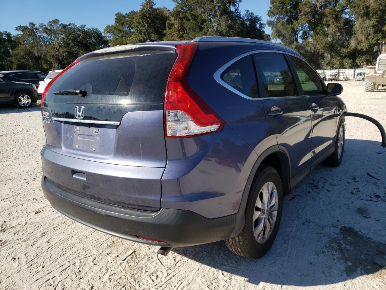 Photo 4 from auction – 2012 HONDA CR-V EXL with VIN 5J6RM3H77CL012299