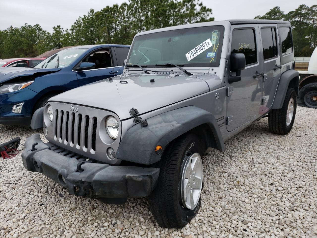 Photo 2 from auction – 2016 JEEP WRANGLER U with VIN 1C4BJWDG3GL242029