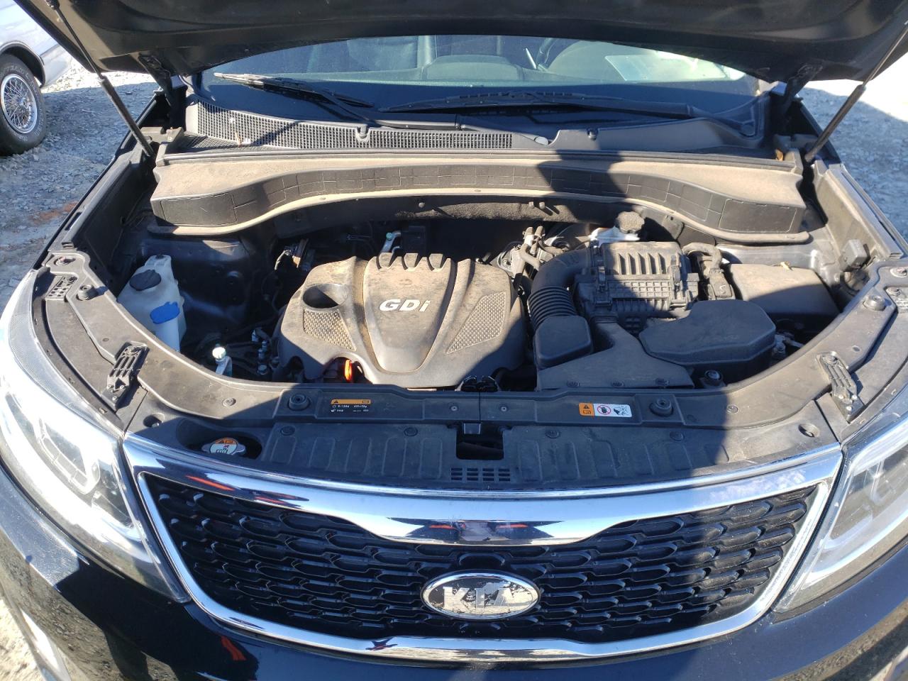Photo 7 from auction – 2014 KIA SORENTO LX with VIN 5XYKT3A65EG520409
