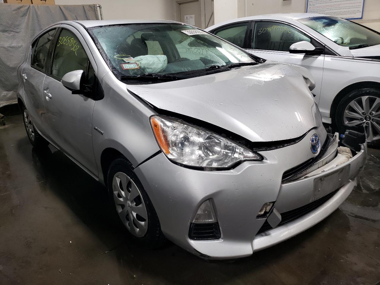 Photo 1 from auction – 2014 TOYOTA PRIUS C with VIN JTDKDTB3XE1569218
