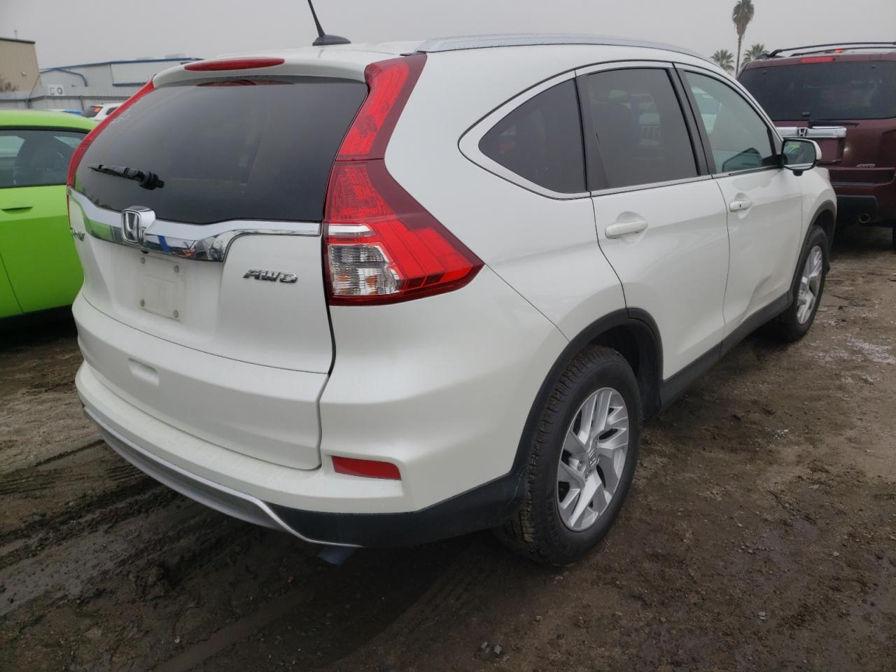 Photo 4 from auction – 2016 HONDA CR-V EXL with VIN 5J6RM4H73GL003918