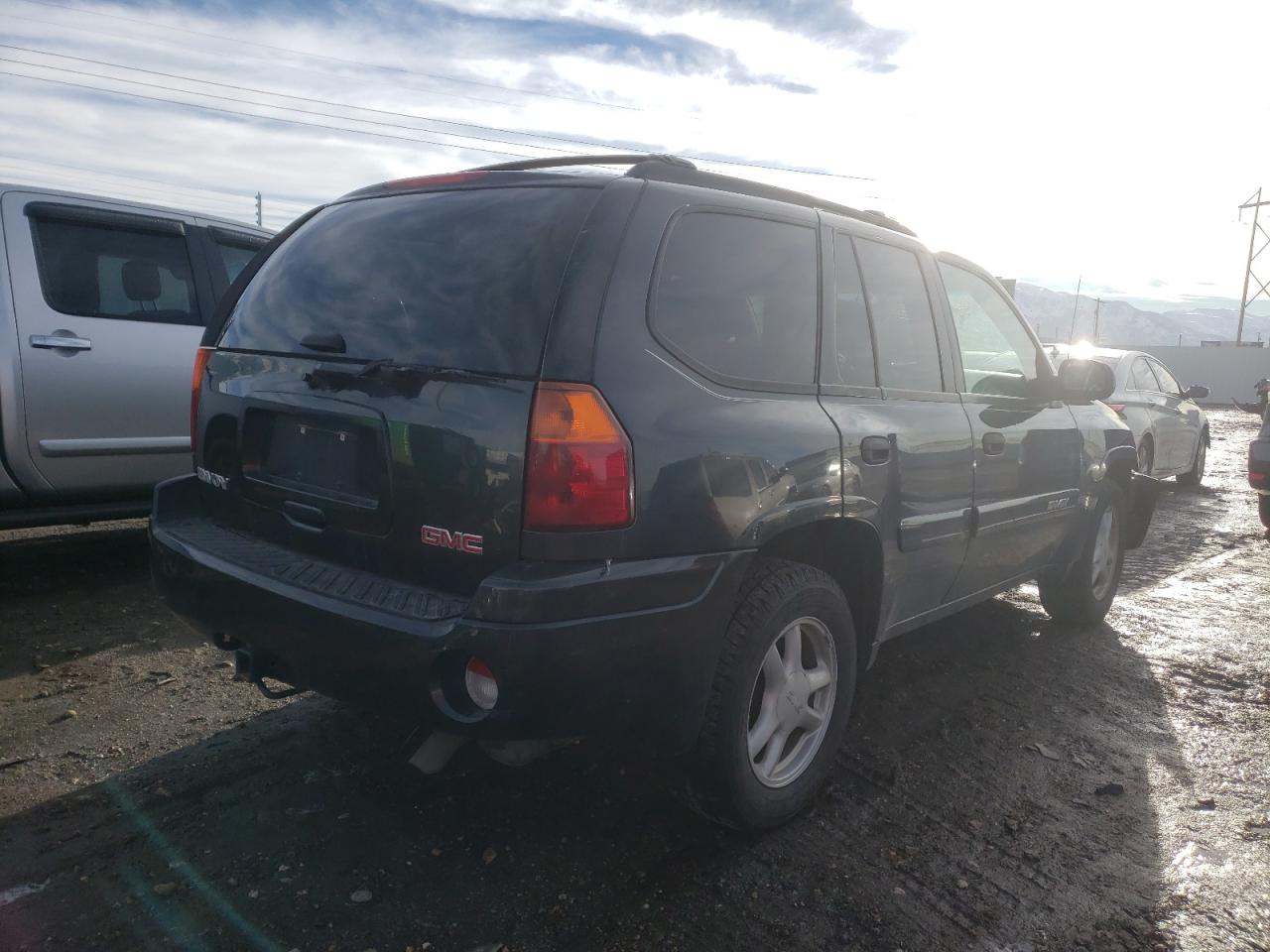 Photo 4 from auction – 2005 GMC ENVOY with VIN 1GKDT13S352133993