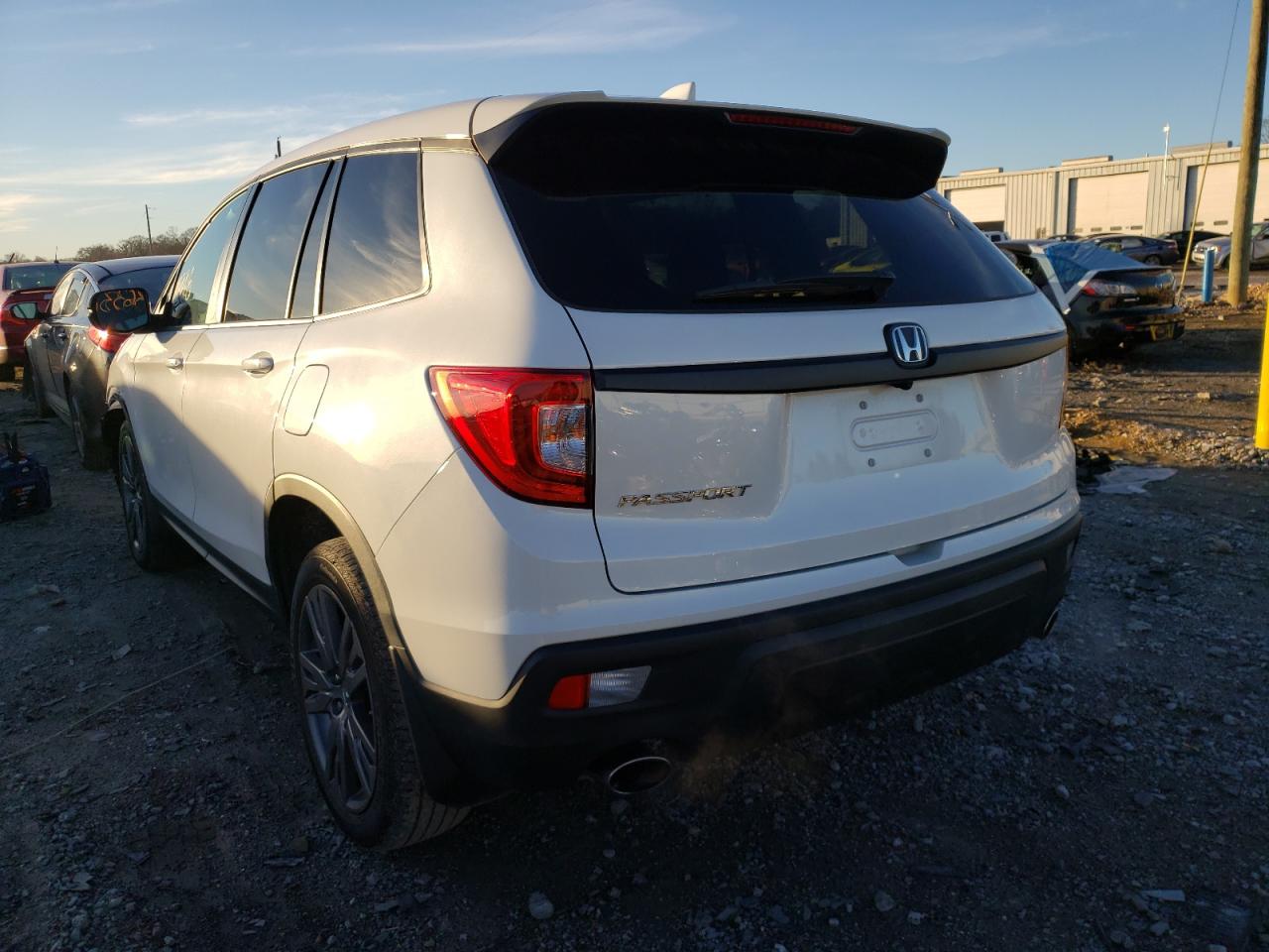 Photo 3 from auction – 2021 HONDA PASSPORT E with VIN 5FNYF7H53MB002021
