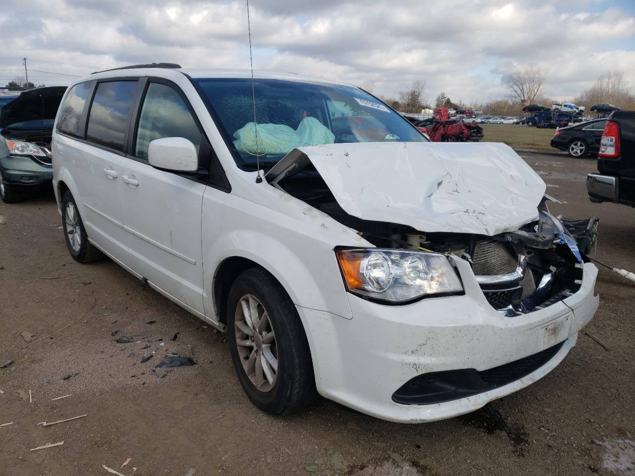 DODGE GRAND CARA 2015 with VIN 2C4RDGCG4FR555819 - Photo from auction