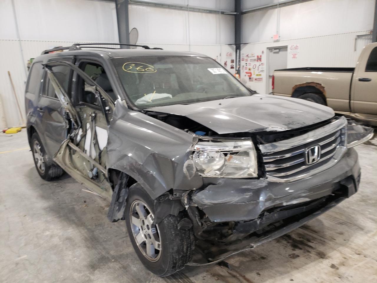 HONDA PILOT LX 2012 with VIN 5FNYF4H28CB002647 - Photo from auction