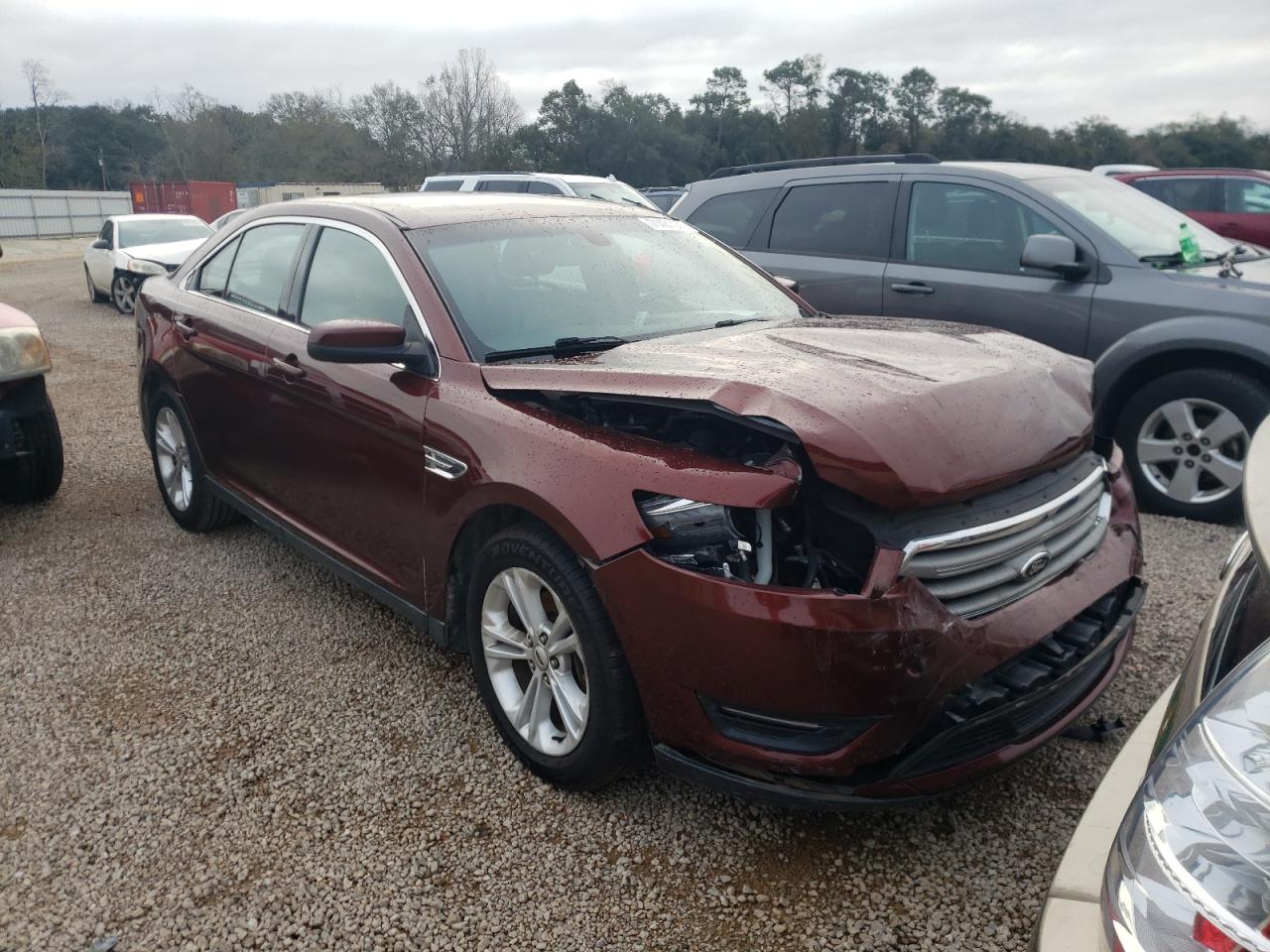 FORD TAURUS SEL 2015 con VIN 1FAHP2E83FG127808 - Foto de la subasta