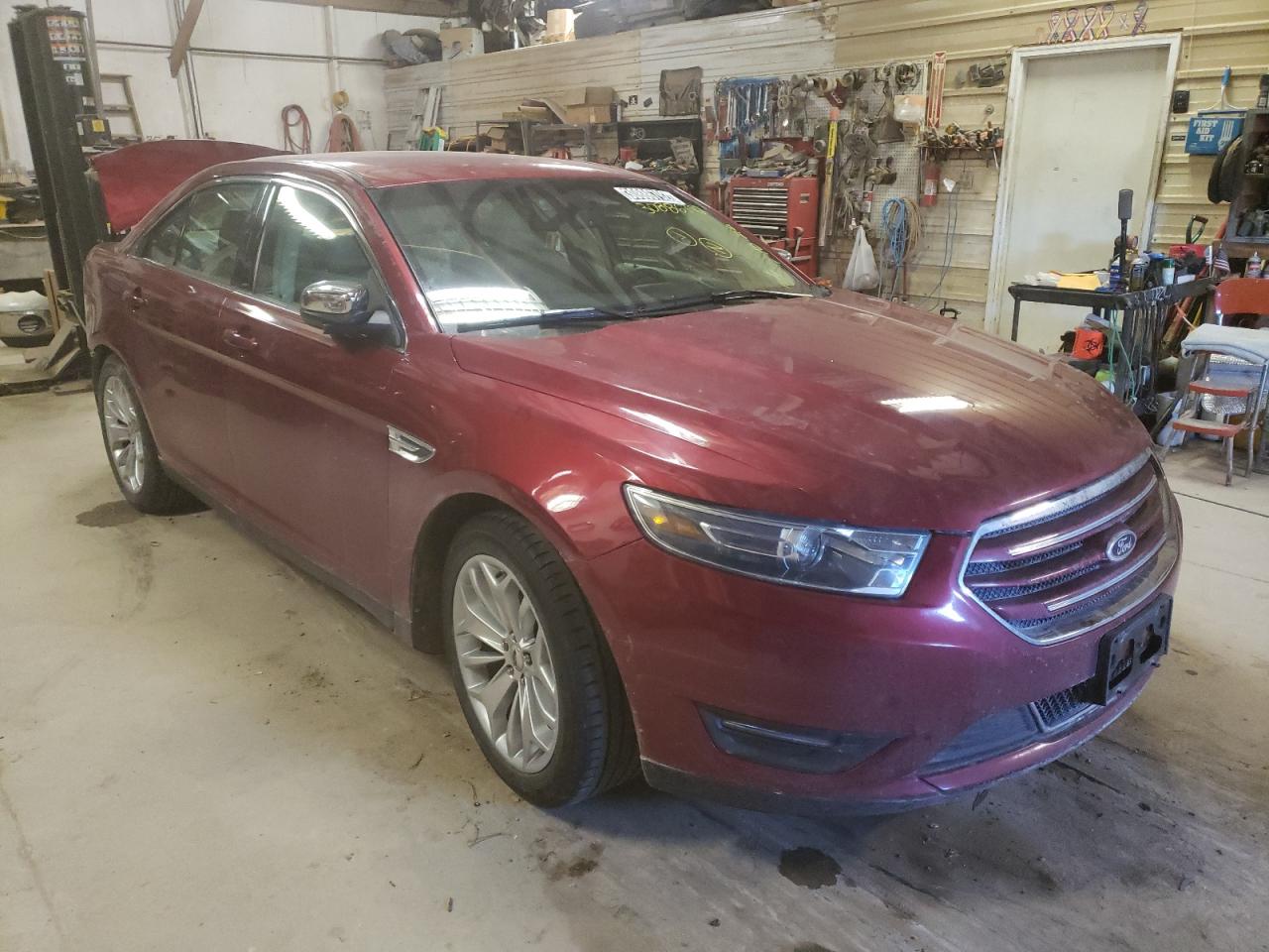 FORD TAURUS LIM 2014 with VIN 1FAHP2F86EG165255 - Photo from auction