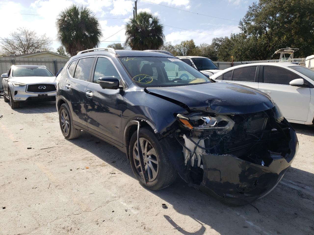 NISSAN ROGUE S 2015 with VIN 5N1AT2MT7FC897140 - Photo from auction