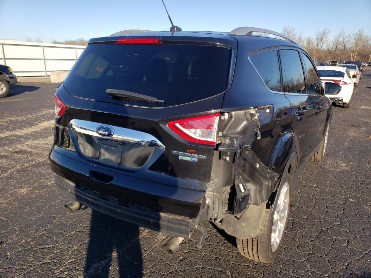 Photo 4 from auction – 2014 FORD ESCAPE TIT with VIN 1FMCU9JX5EUD24610