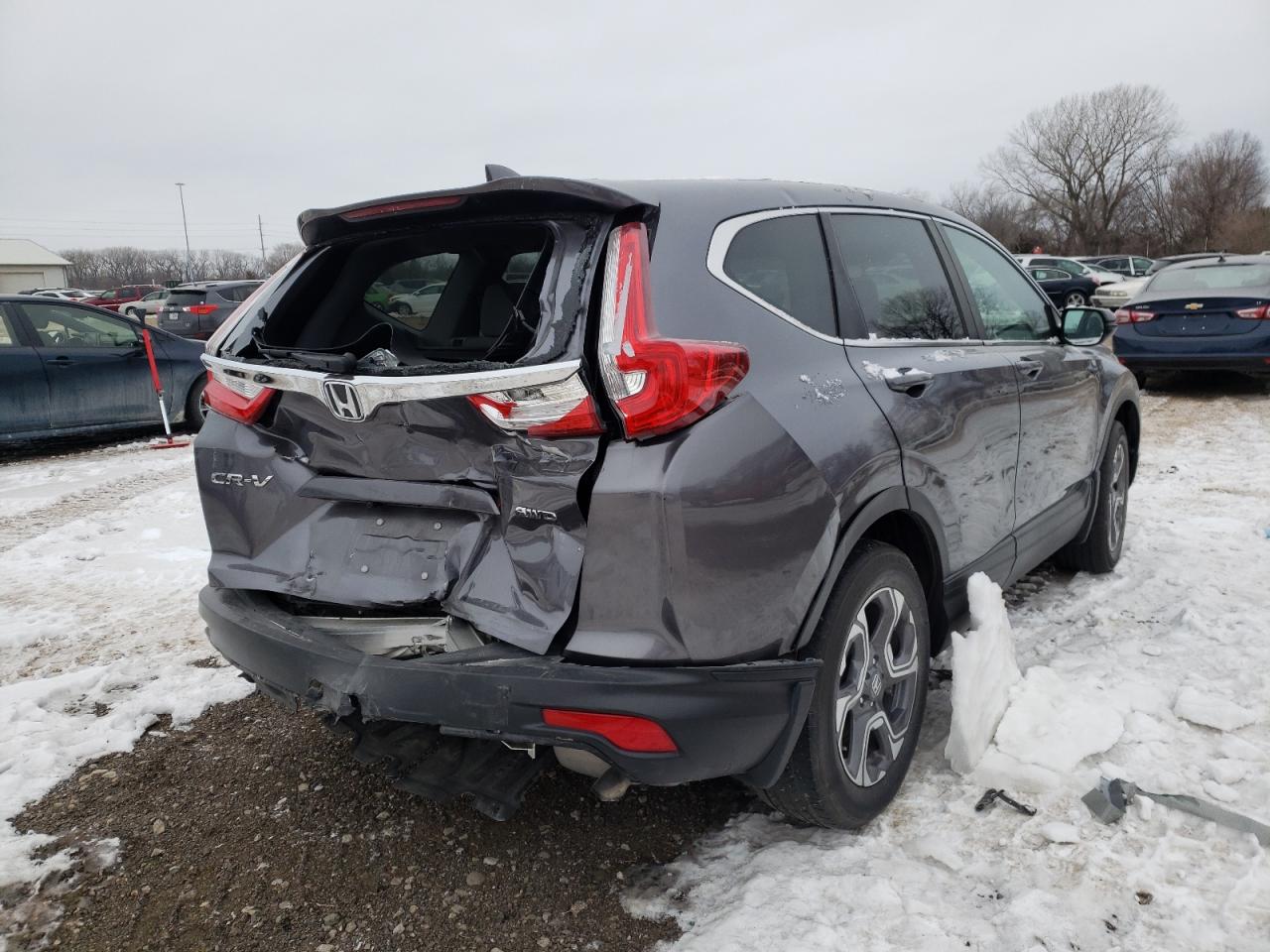Photo 4 from auction – 2018 HONDA CR-V EX with VIN 7FARW2H56JE074855