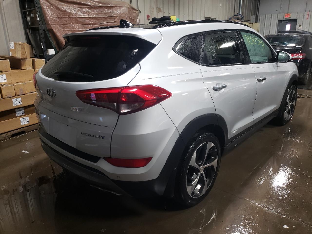 Photo 4 from auction – 2016 HYUNDAI TUCSON LIM with VIN KM8J33A29GU249828