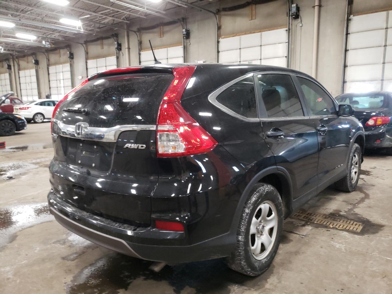 Photo 4 from auction – 2015 HONDA CR-V LX with VIN 5J6RM4H32FL004070