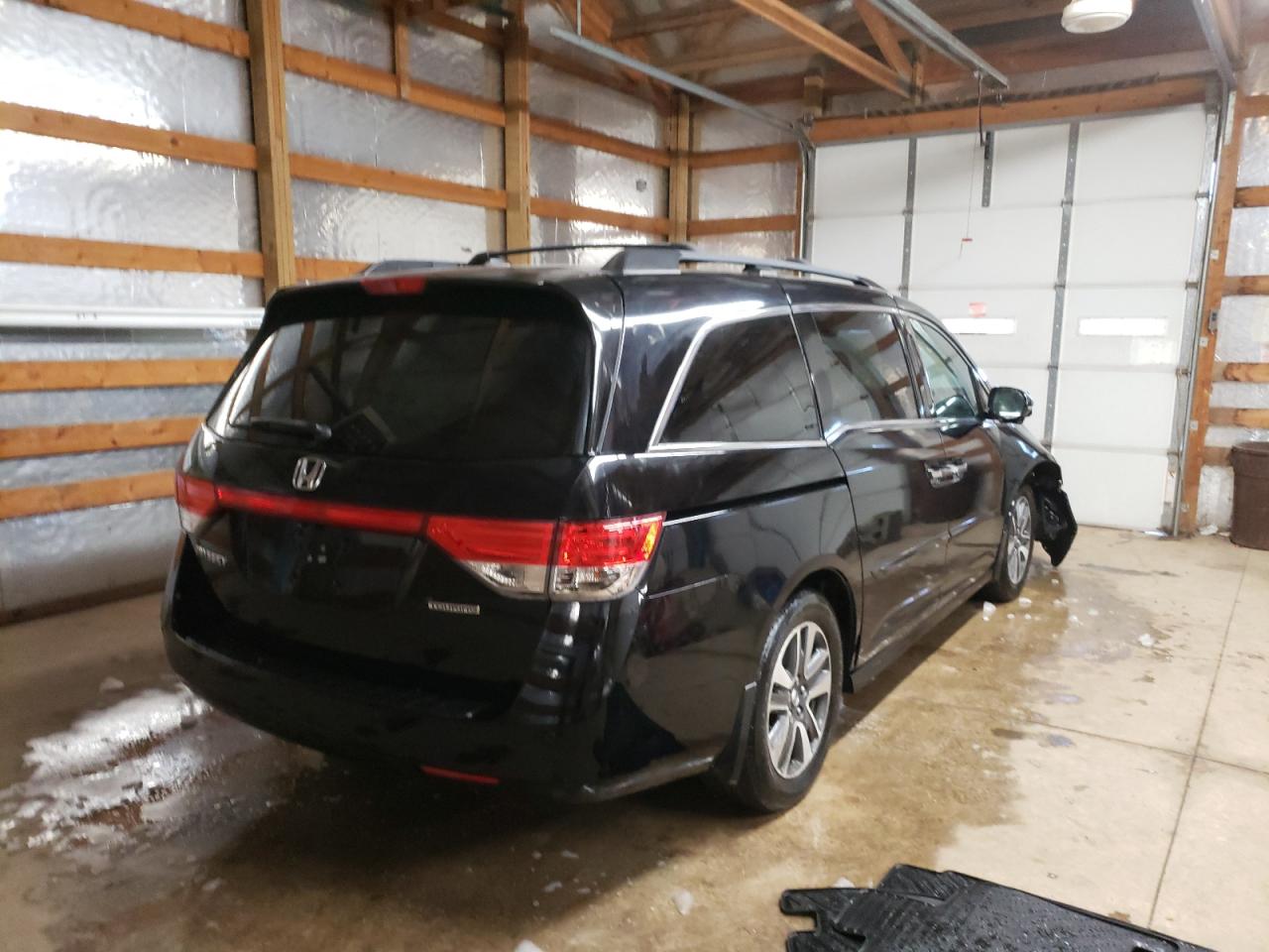 Photo 4 from auction – 2014 HONDA ODYSSEY TO with VIN 5FNRL5H96EB057472