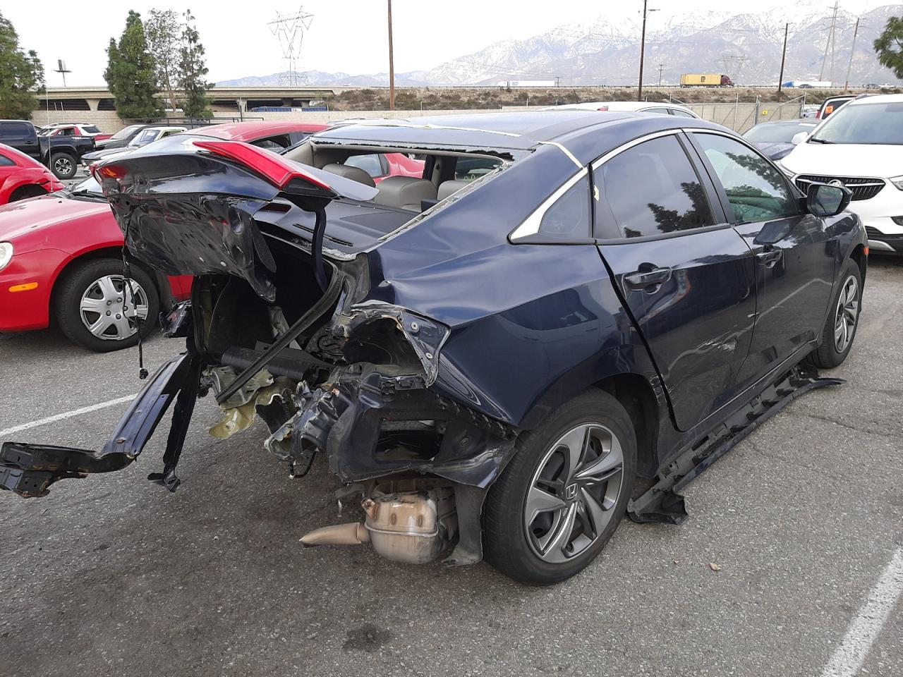Photo 4 from auction – 2019 HONDA CIVIC LX with VIN 2HGFC2F66KH503590