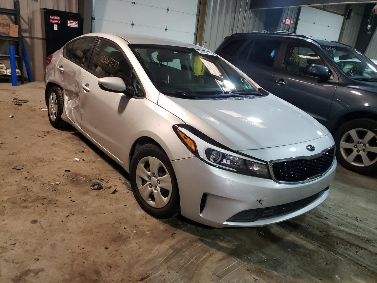 KIA FORTE LX 2017 with VIN 3KPFK4A72HE105780 - Photo from auction