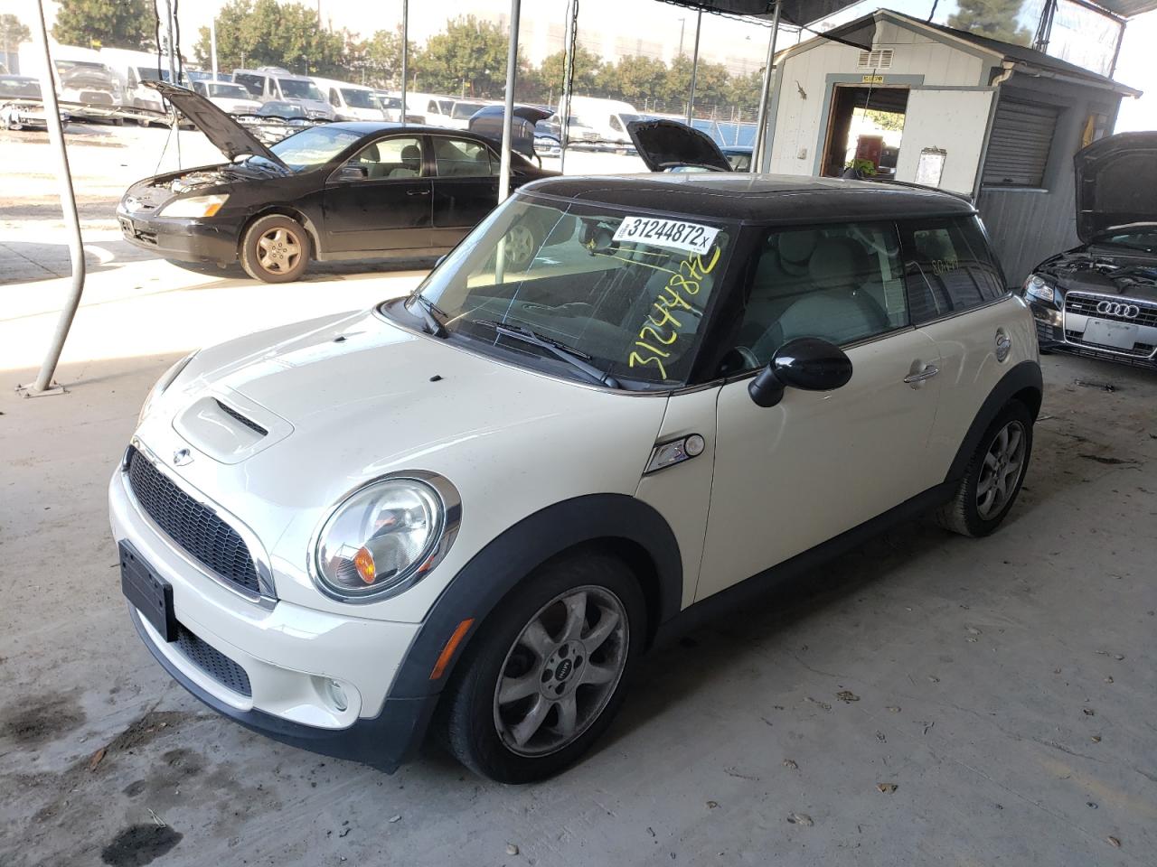 Photo 14 from auction – 2010 MINI COOPER S with VIN WMWMF7C54ATW88629