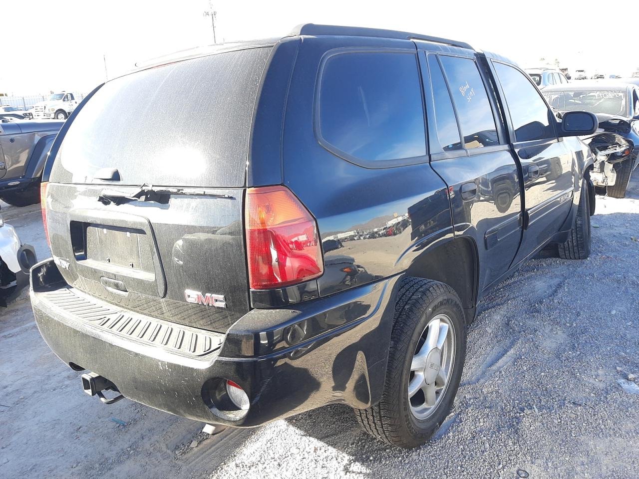 Photo 4 from auction – 2005 GMC ENVOY with VIN 1GKDS13S652192135