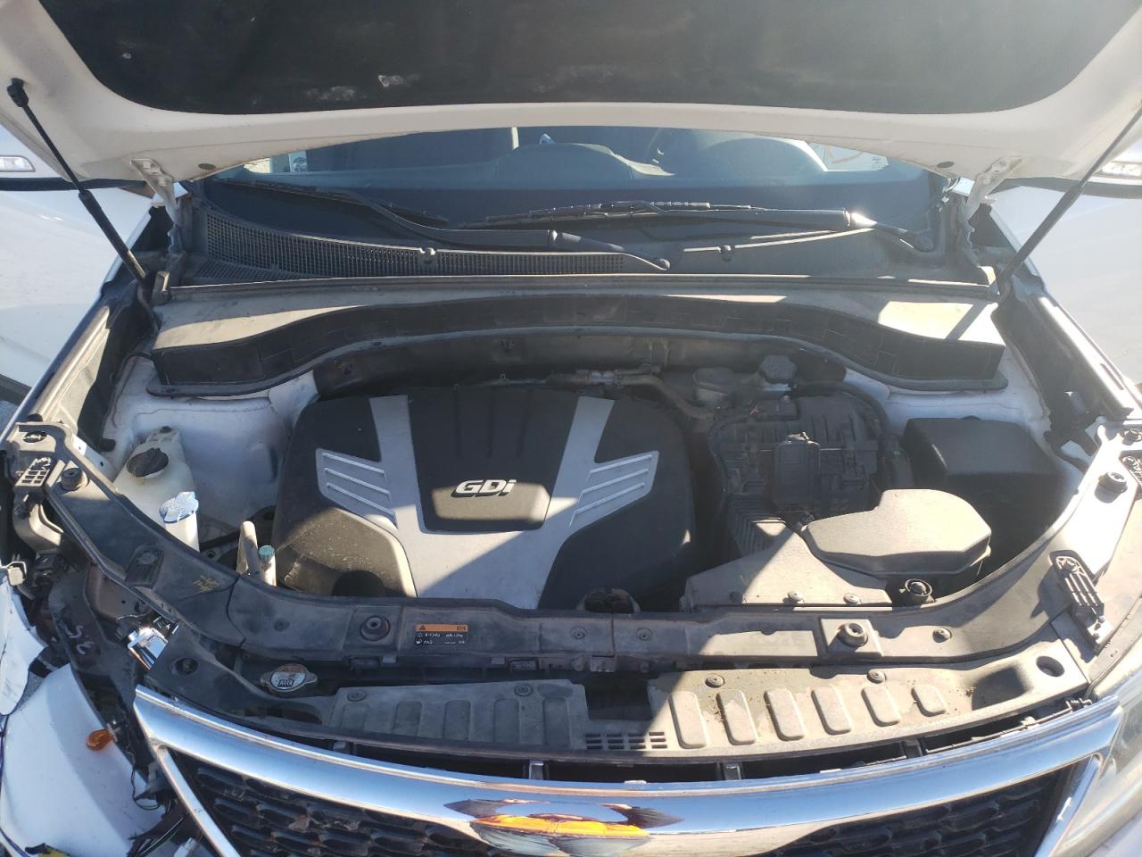 Photo 7 from auction – 2015 KIA SORENTO LX with VIN 5XYKTDA79FG648376
