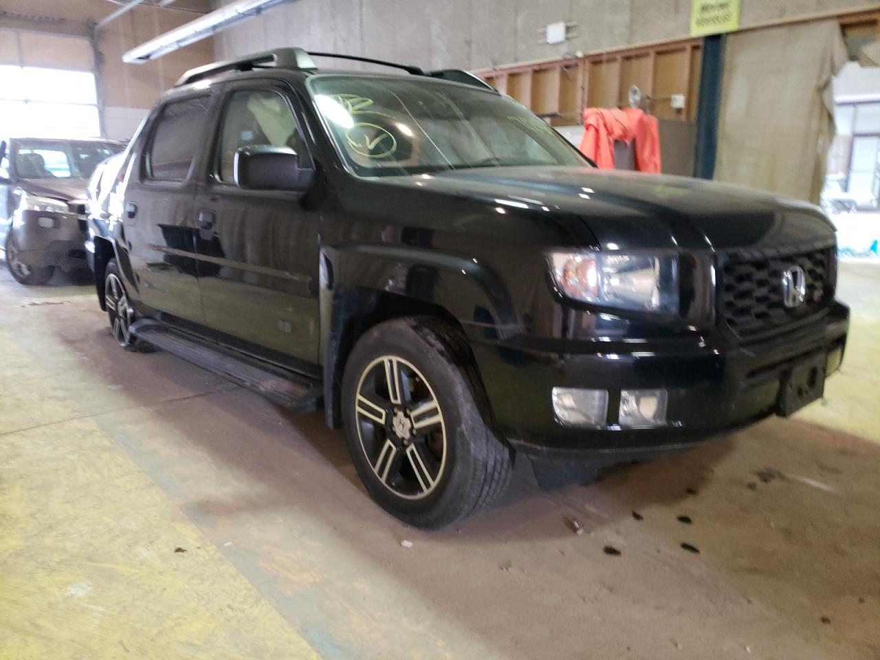 HONDA RIDGELINE 2014 with VIN 5FPYK1F73EB008729 - Photo from auction