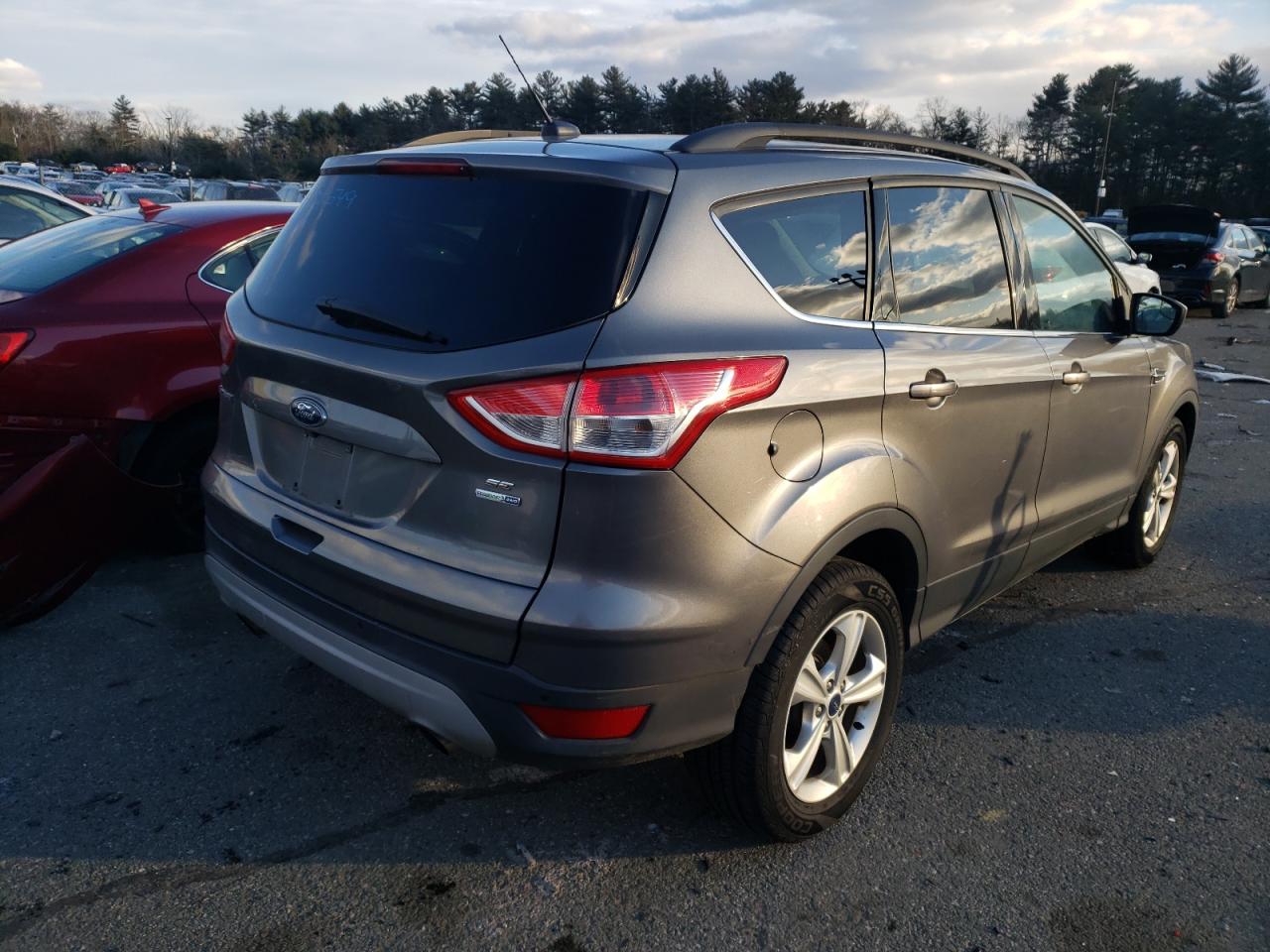 Photo 4 from auction – 2014 FORD ESCAPE SE with VIN 1FMCU9GX7EUE04885