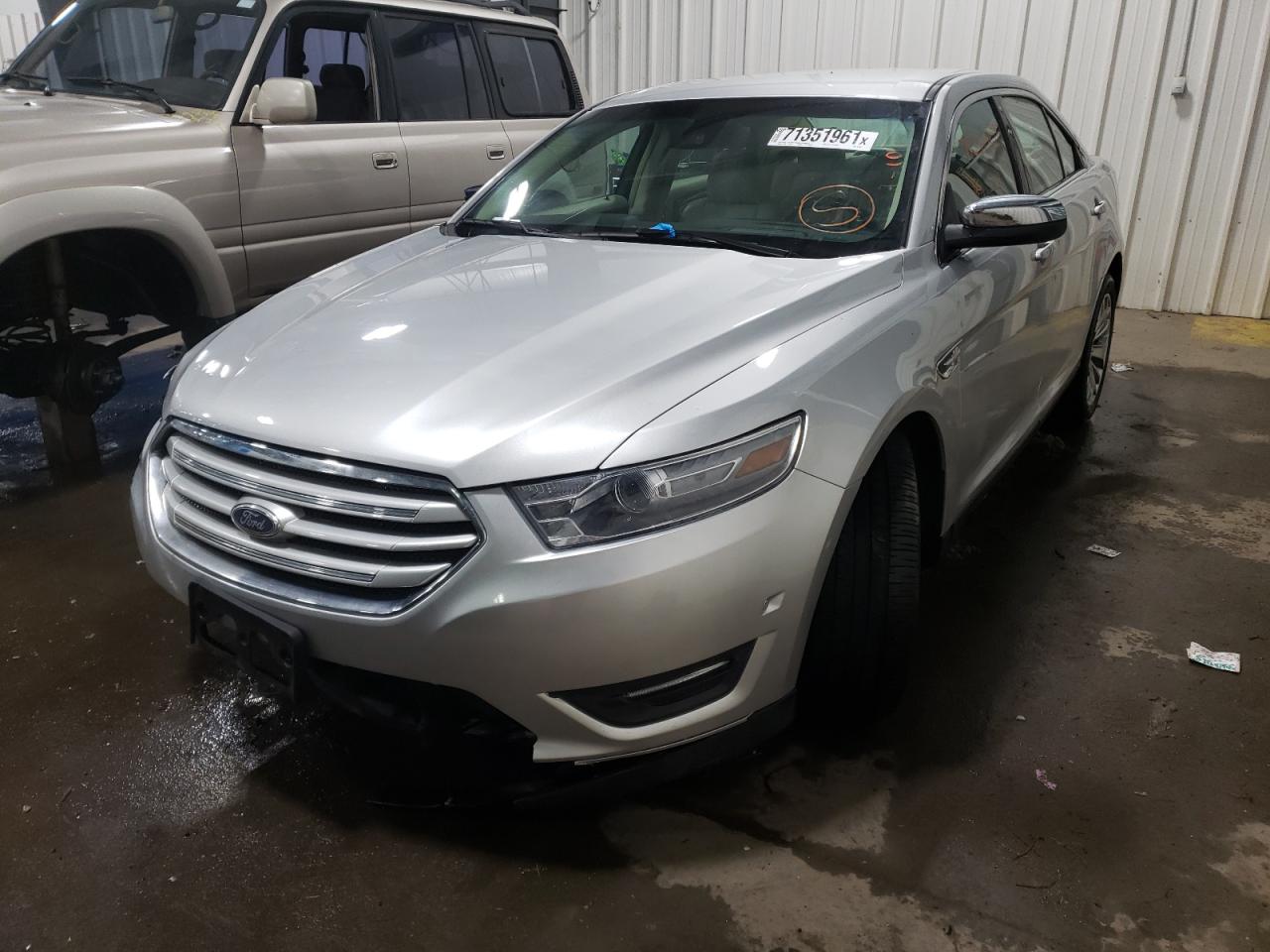 Photo 2 from auction – 2013 FORD TAURUS LIM with VIN 1FAHP2J82DG181037