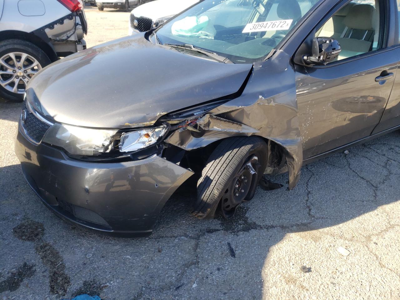 Photo 9 from auction – 2013 KIA FORTE EX with VIN KNAFU4A24D5723202