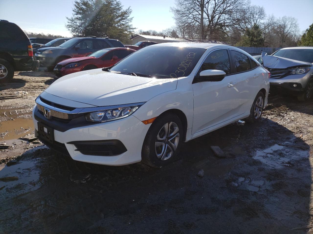 Photo 2 from auction – 2017 HONDA CIVIC LX with VIN 2HGFC2F59HH575285