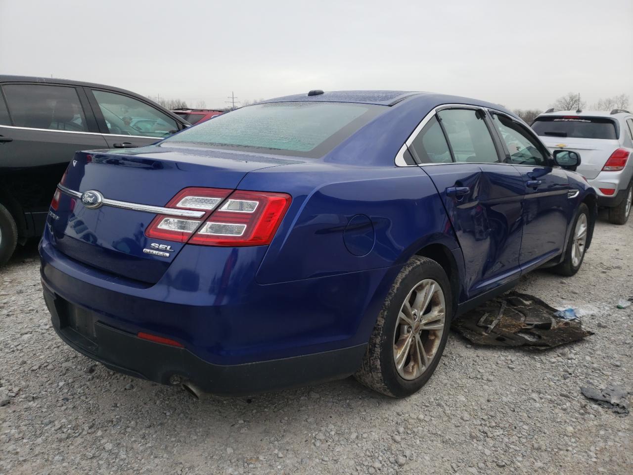 Photo 4 from auction – 2014 FORD TAURUS SEL with VIN 1FAHP2E80EG108423