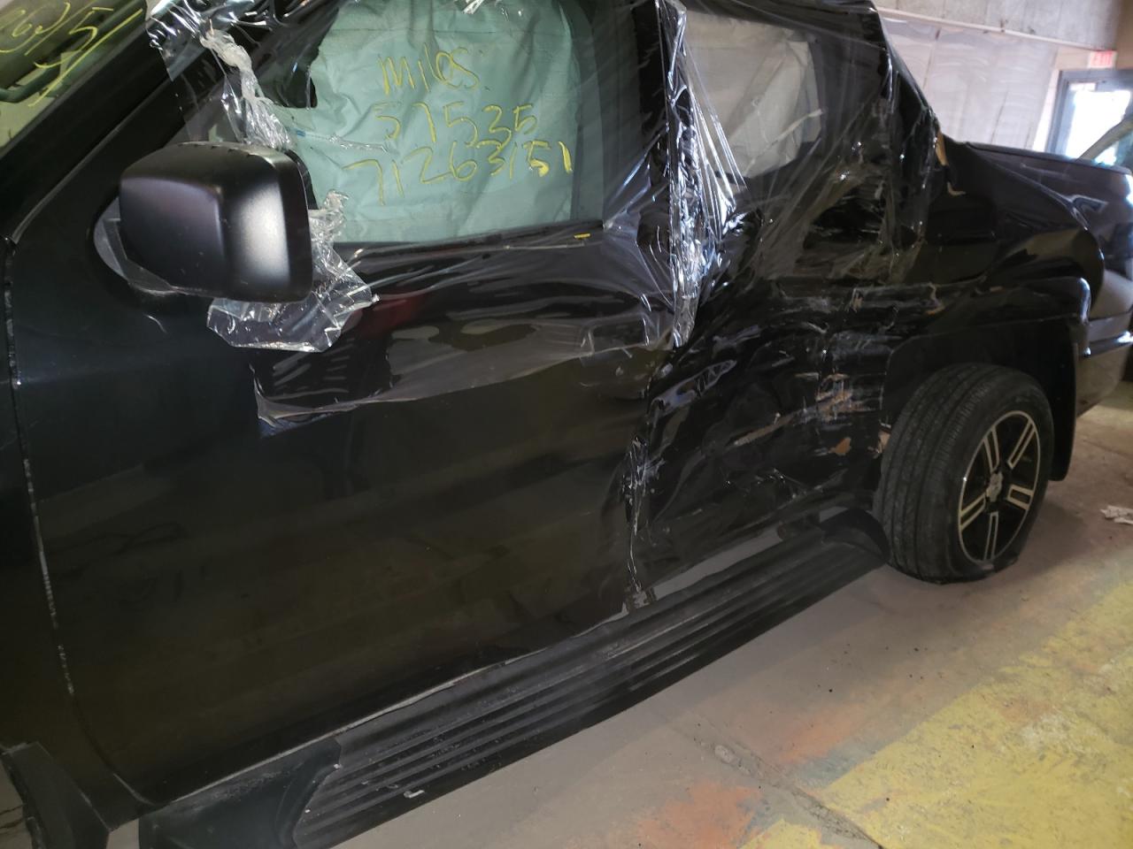 Photo 9 from auction – 2014 HONDA RIDGELINE with VIN 5FPYK1F73EB008729