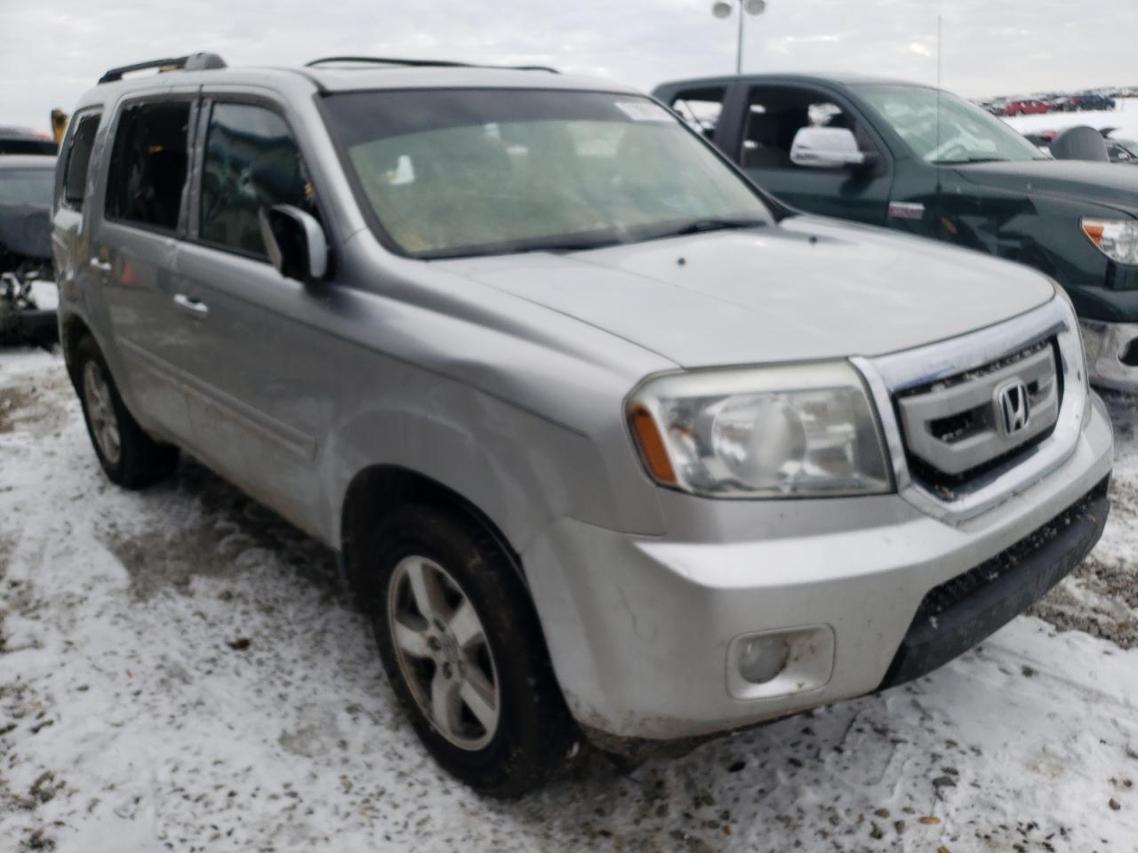 HONDA PILOT EXL 2011 with VIN 5FNYF4H62BB092685 - Photo from auction