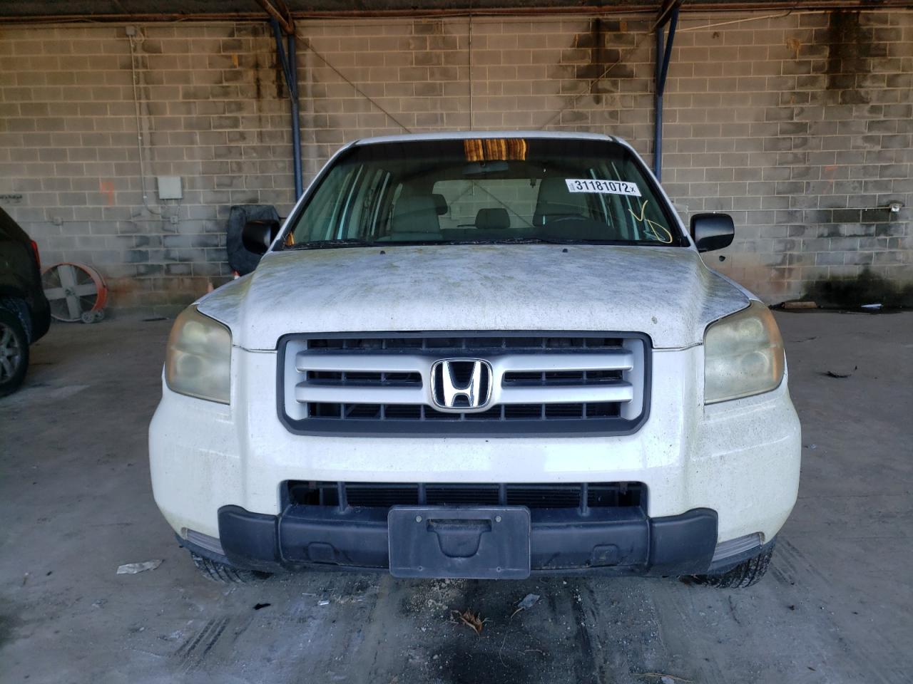 Photo 9 from auction – 2006 HONDA PILOT LX with VIN 5FNYF28196B030571