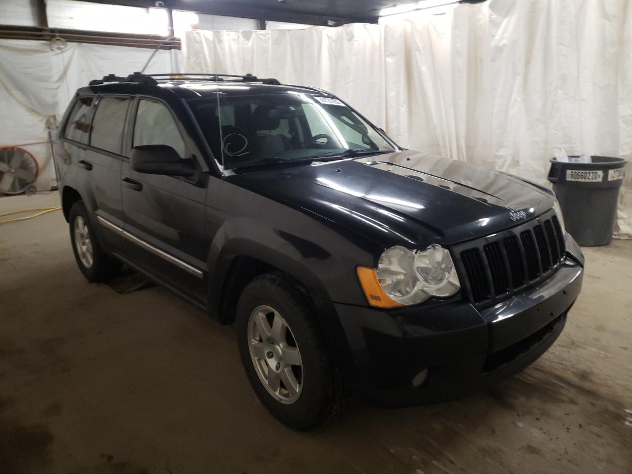 JEEP GRAND CHER 2010 with VIN 1J4PR4GK7AC129060 - Photo from auction