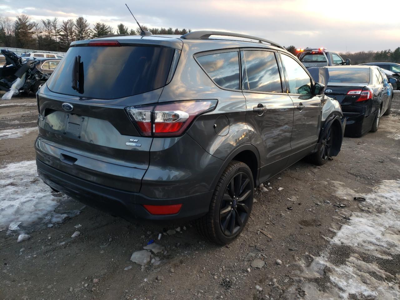 Photo 4 from auction – 2017 FORD ESCAPE SE with VIN 1FMCU9GD8HUD50412