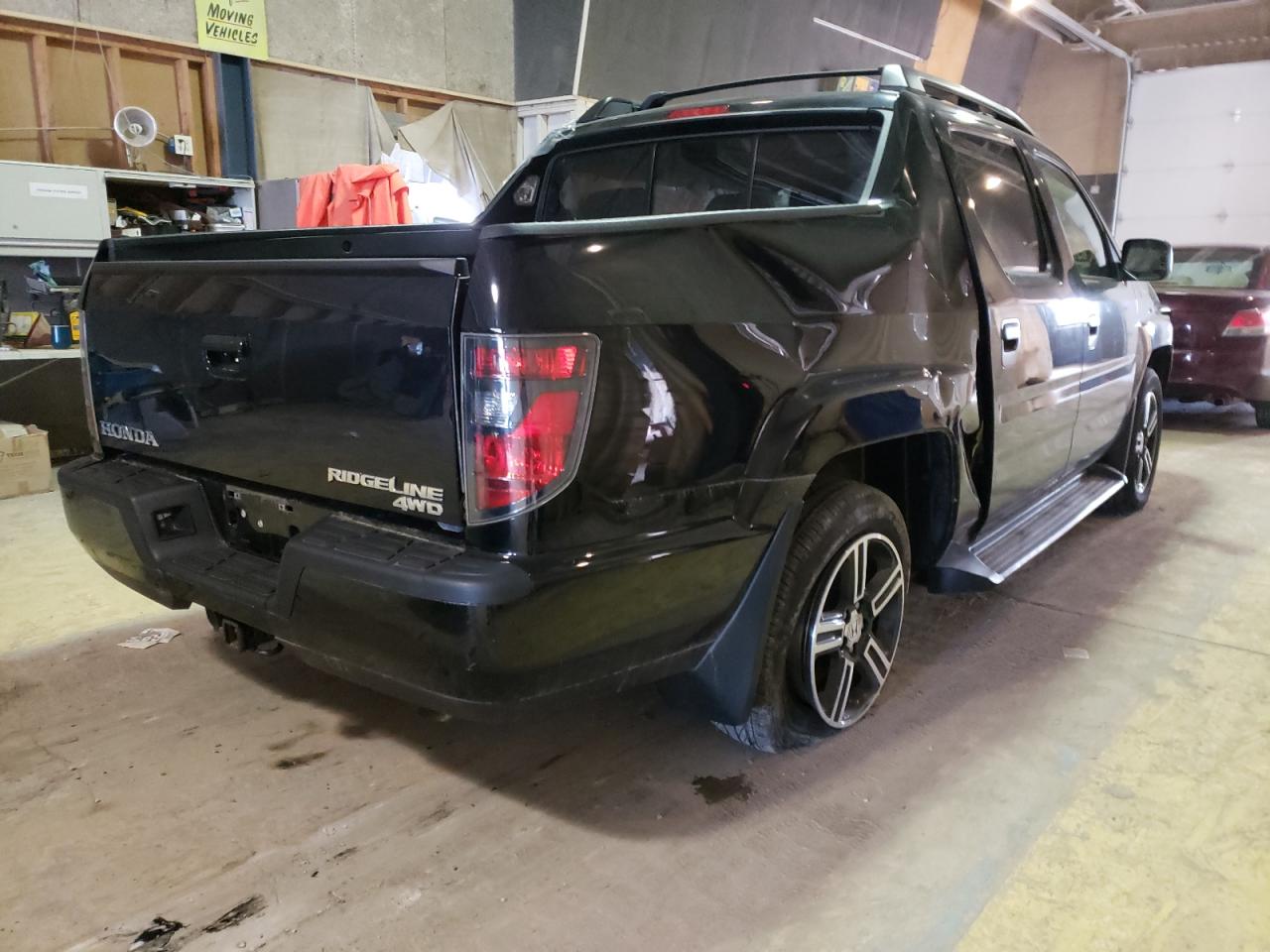 Photo 4 from auction – 2014 HONDA RIDGELINE with VIN 5FPYK1F73EB008729