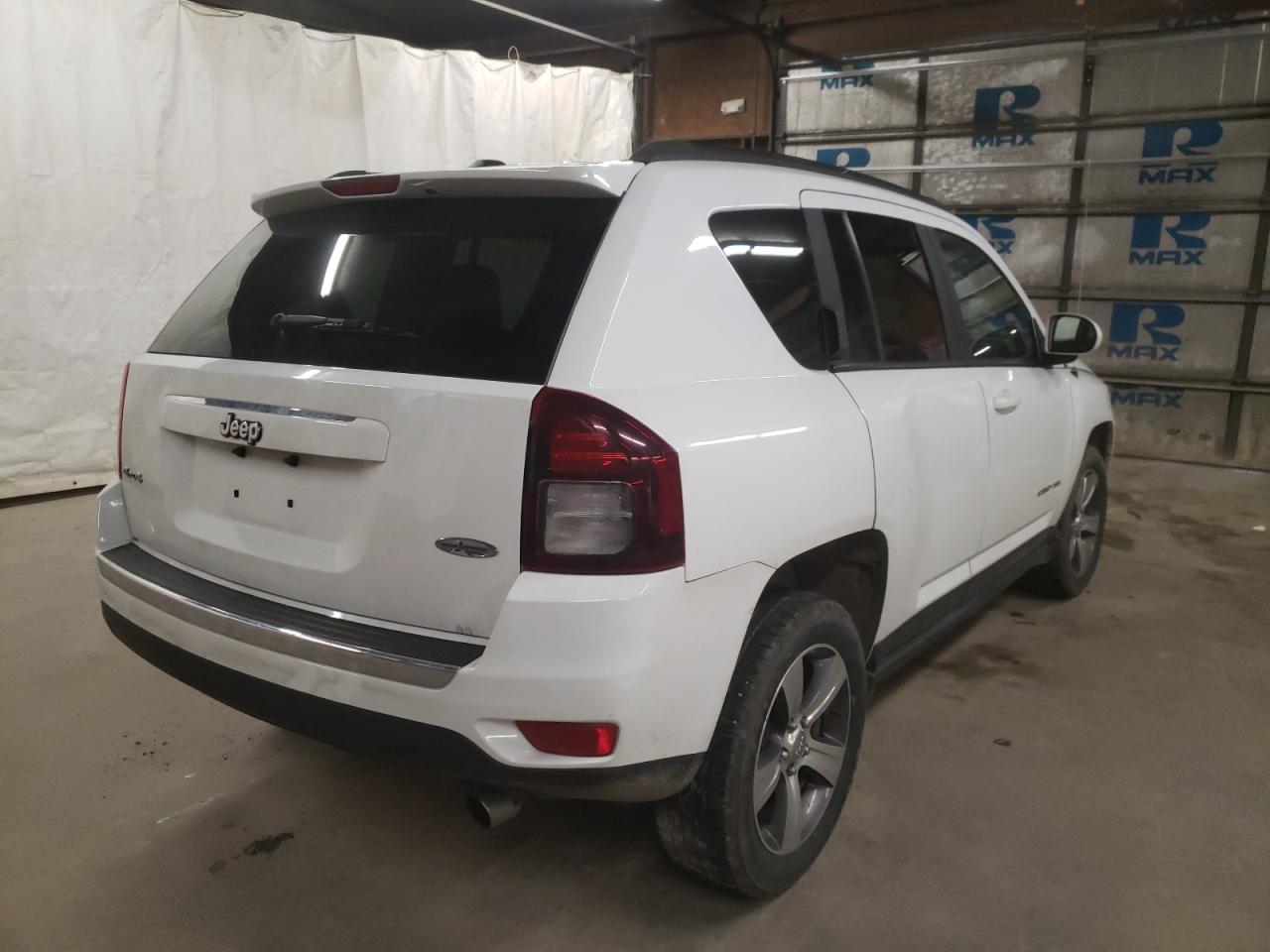 Photo 4 from auction – 2016 JEEP COMPASS LA with VIN 1C4NJDEB5GD579378