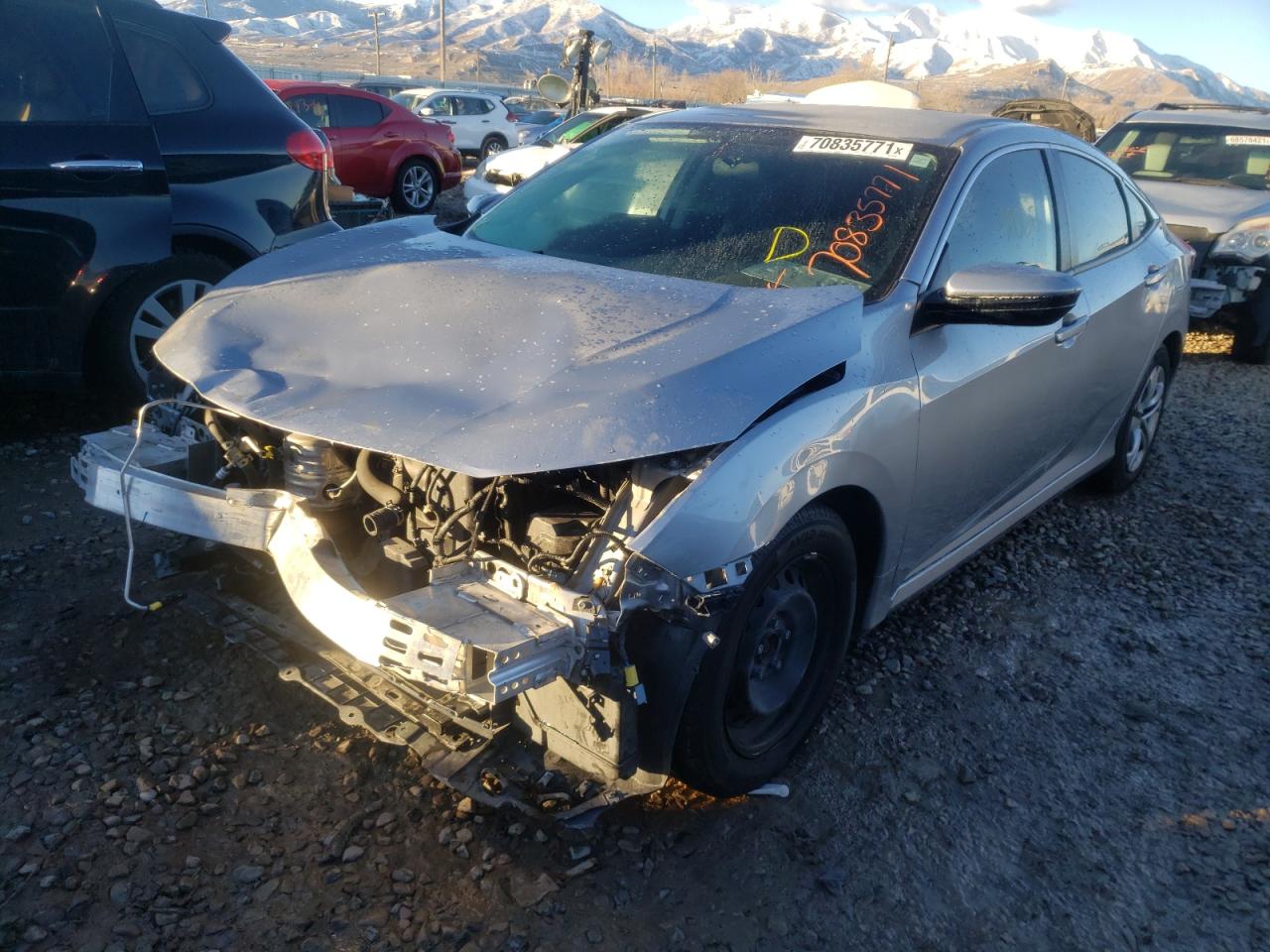 Photo 2 from auction – 2018 HONDA CIVIC LX with VIN 19XFC2F59JE018568