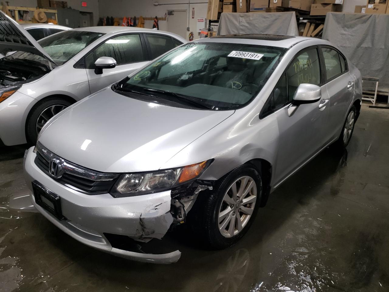 Photo 2 from auction – 2012 HONDA CIVIC with VIN 19XFB2F94CE053818