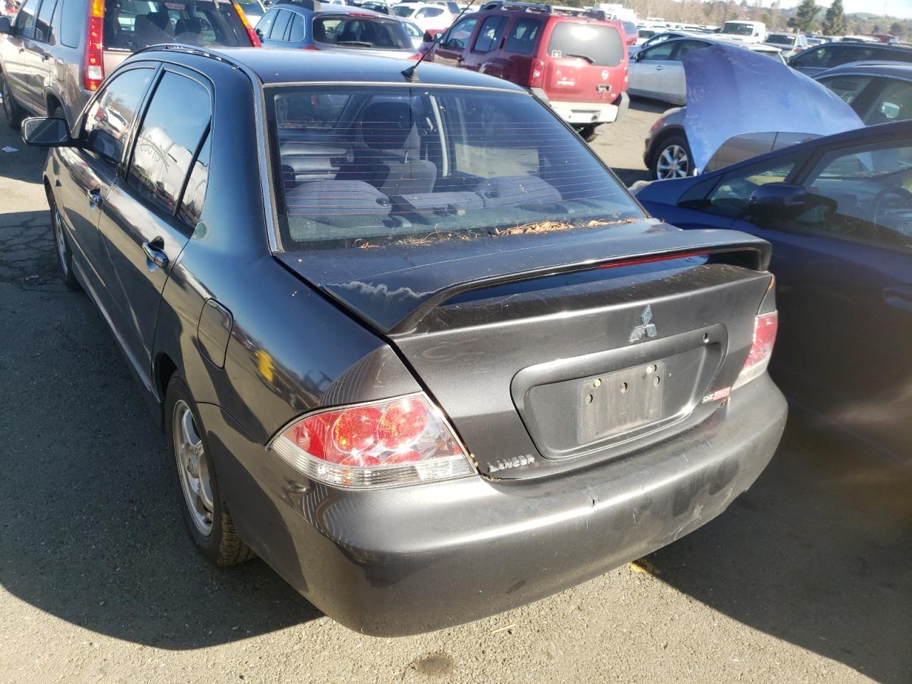 Photo 3 from auction – 2004 MITSUBISHI LANCER OZ with VIN JA3AJ86E84U036034